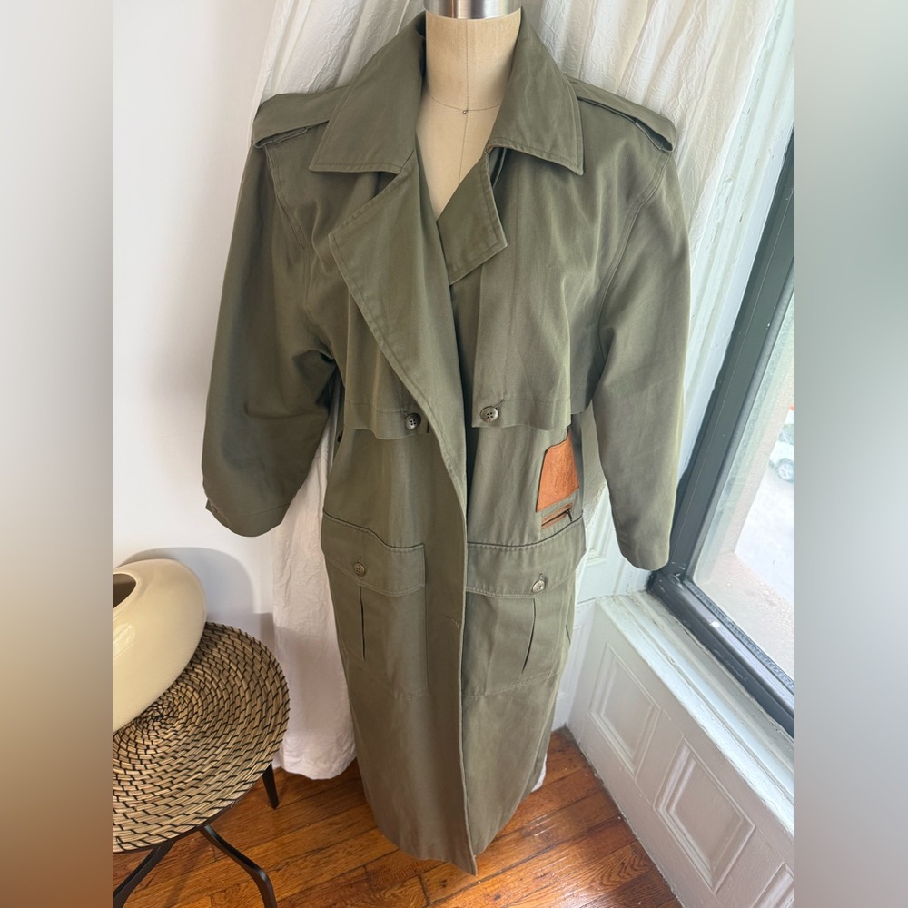 Olive green vintage trench coat with leather brown patch under the collar